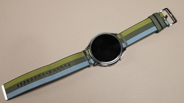 The woven strap is breathable, quick-drying, and pairs well with the silver stainless steel case