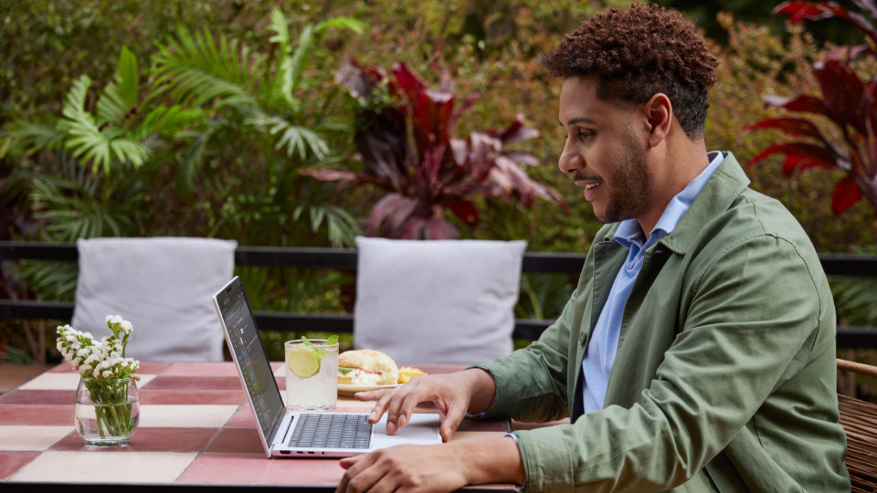 Picture of HP laptop in use.