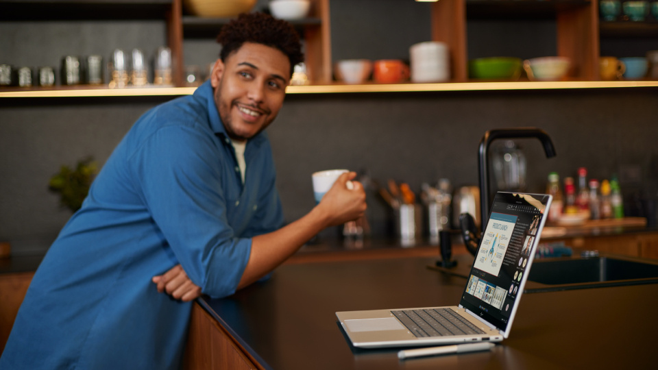 Picture of HP laptop in use.