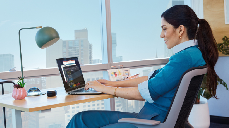 Picture of HP laptop in use.