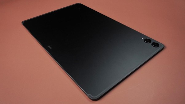 A look at the incredibly thin 5.1mm profile of the tablet, showcasing its sleek design and the dual rear cameras.