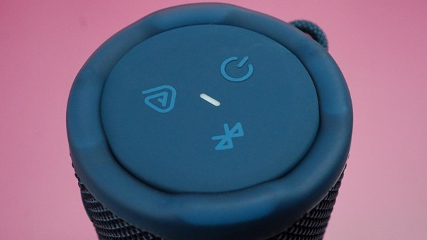 The controls are positioned clearly, with power, Bluetooth and Auracast buttons on the top