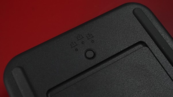 The dial module is wireless and battery powered, so you can drop it wherever it feels most natural on your desk, and use the button on the back to switch between devices