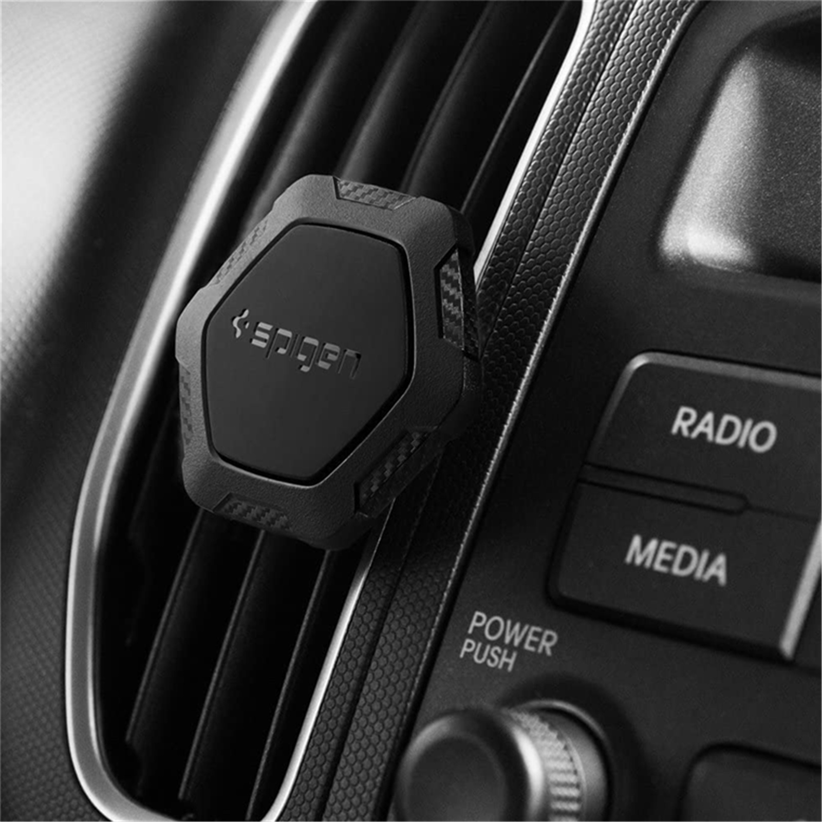 Spigen Signature Air Vent Magnetic Universal Car Mount Holder -Easy installation, Mount In Simplicity,  Any Orientation, Portable Usability, Rugged hexagon design with carbon fiber accent- 000CG20879